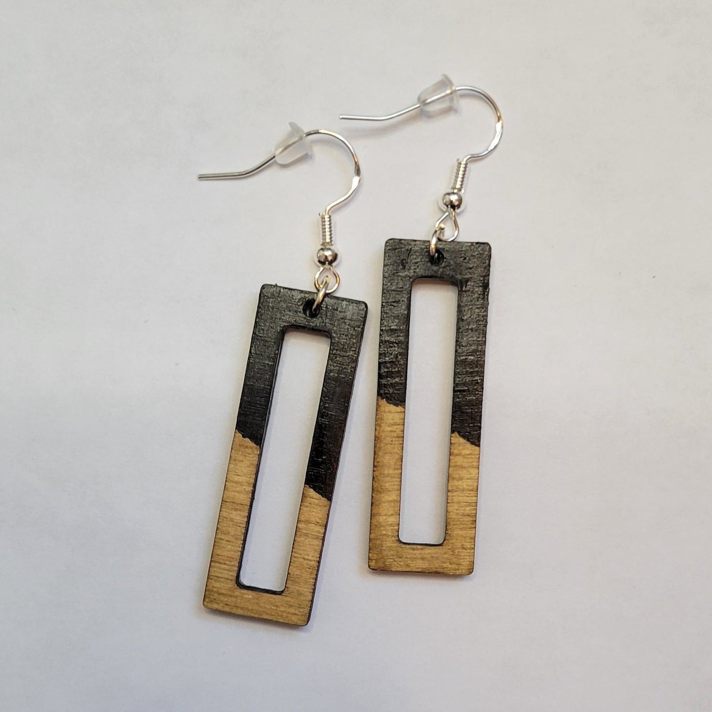 black and golden oak rectangle dangle wooden handmade earrings on a white background