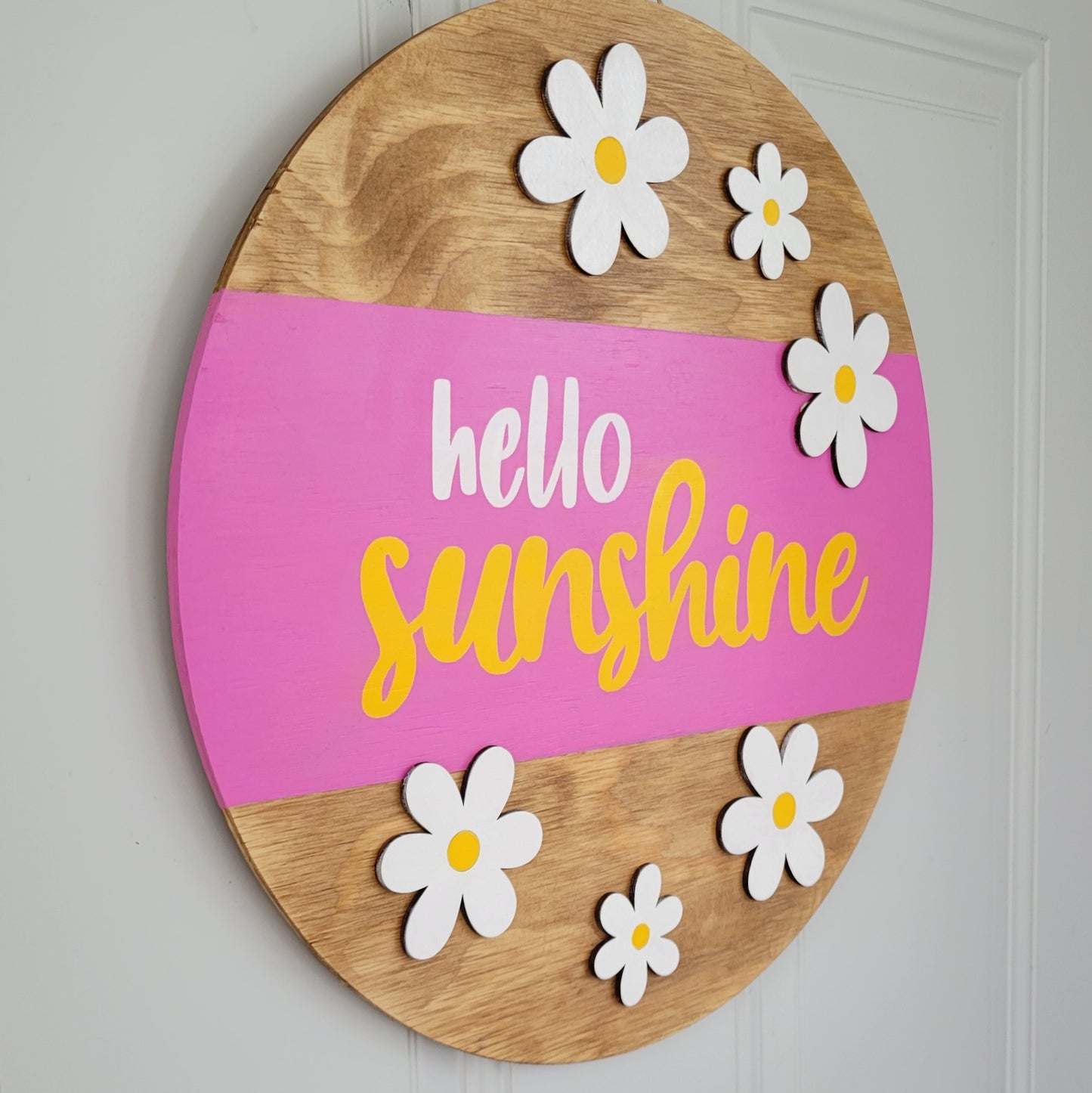 Hello_Sunshine_Daisy_Door_Hanger_hanging on door pink, yellow white and golden oak angle