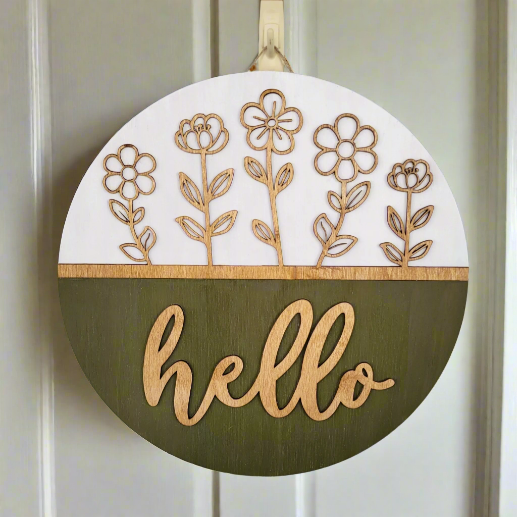 olive green, white and golden oak hello door hanger with cutout stemmed flowers hanging on door 2