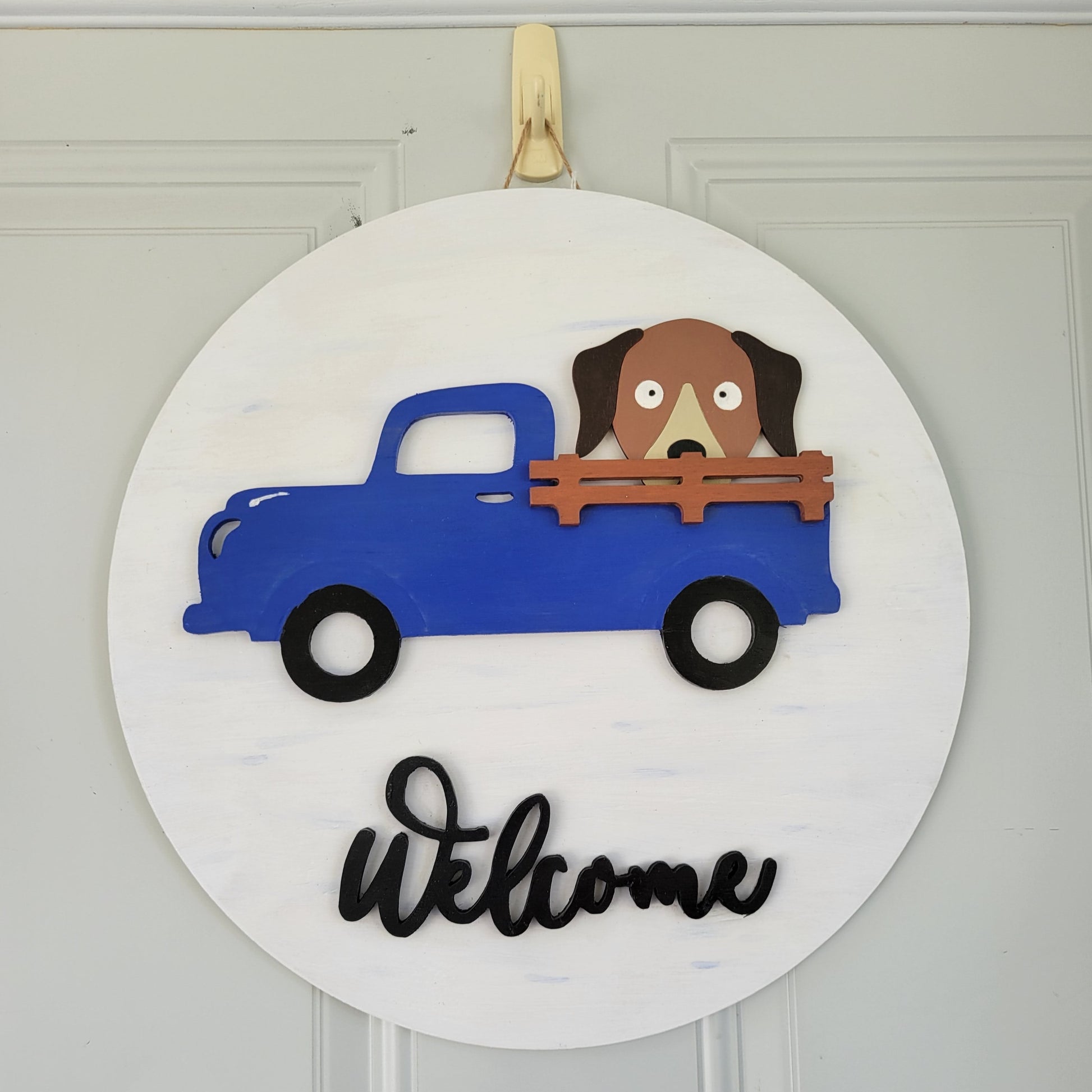 Welcome Truck interchangeable holiday door hanger with dog