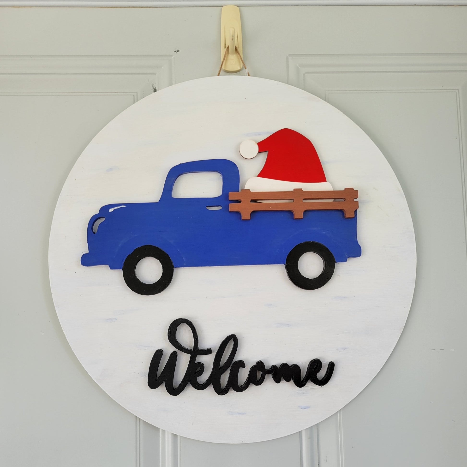 Welcome Truck interchangeable holiday door hanger with Santa hat