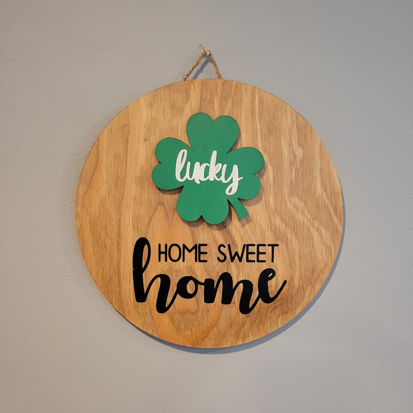 home sweet home golden oak wood round hanging sign with lucky four leaf clover