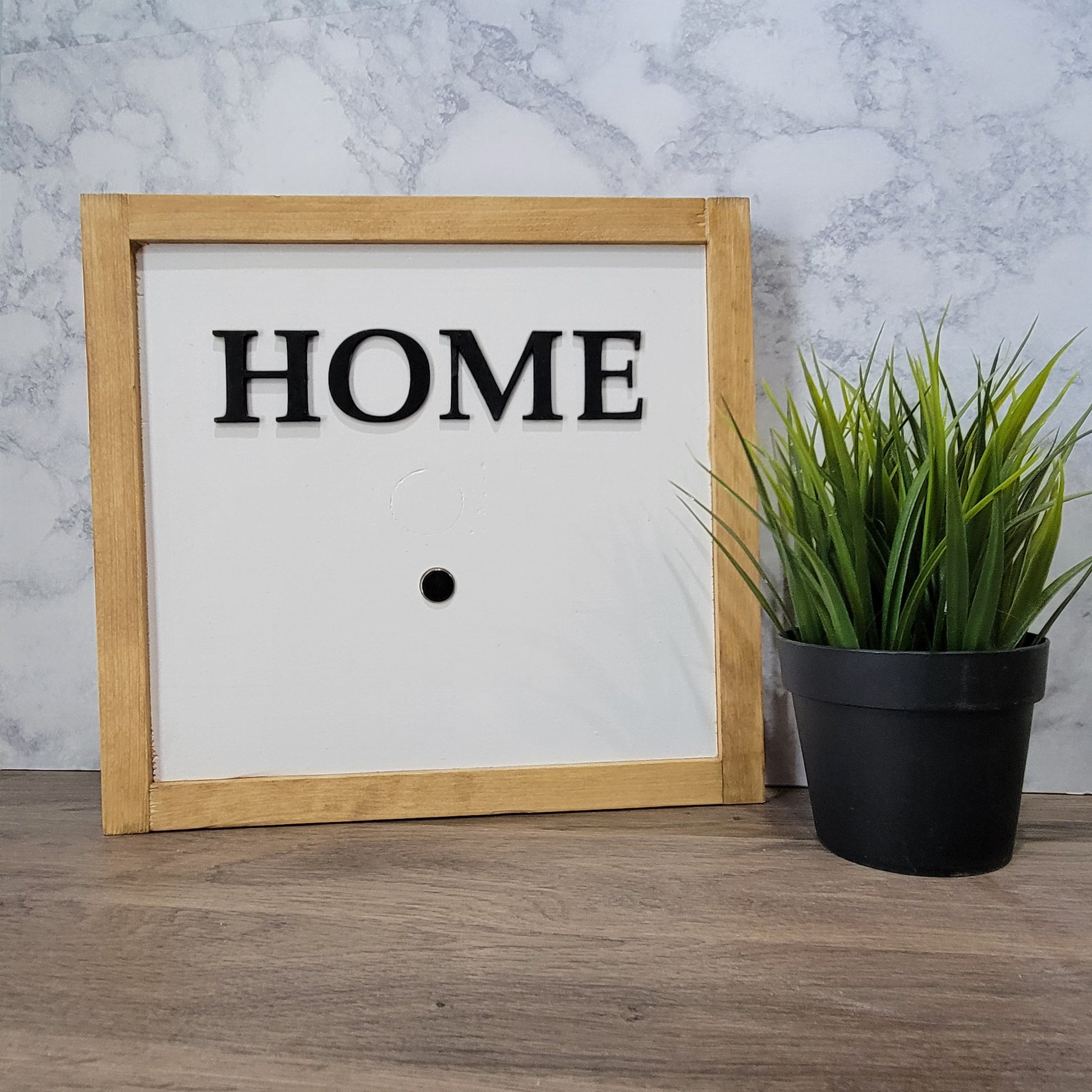 Light wood framed tabletop home sign