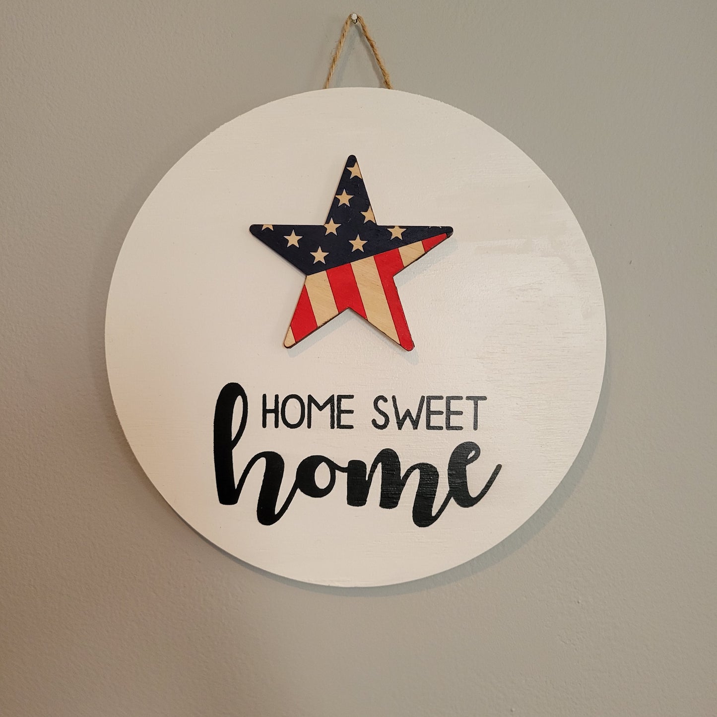 home sweet home white wood round hanging sign with patriotic flag star