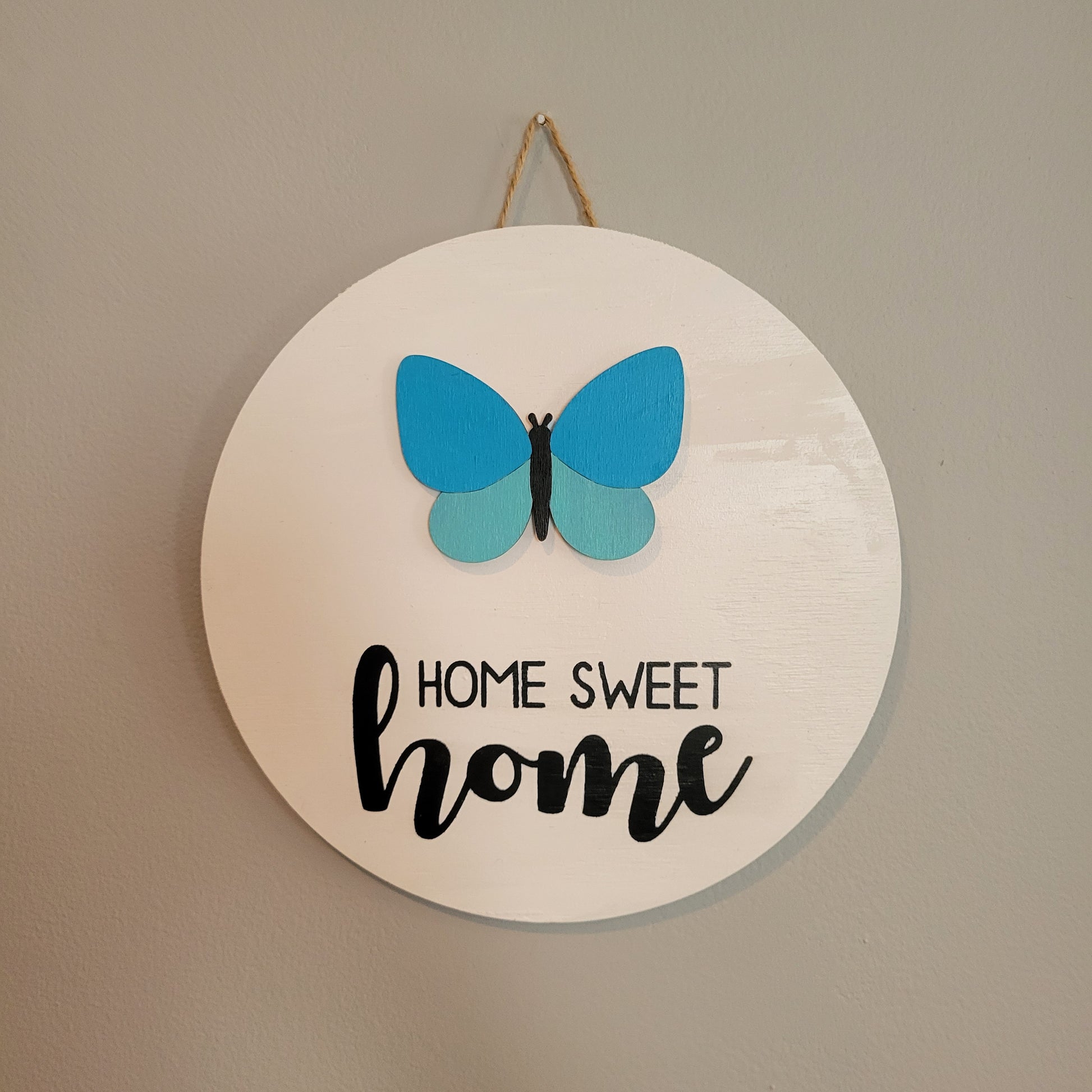 home sweet home white wood round hanging sign with butterfly