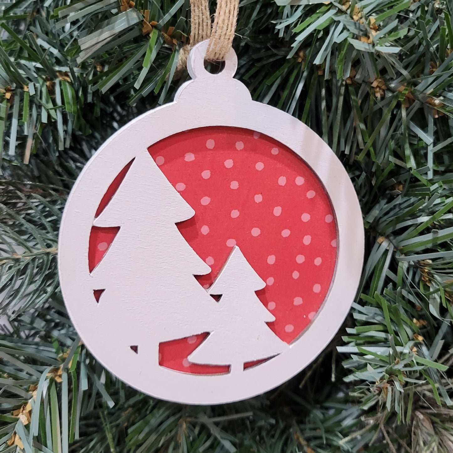 double layer wooden christmas tree with red polka dot background