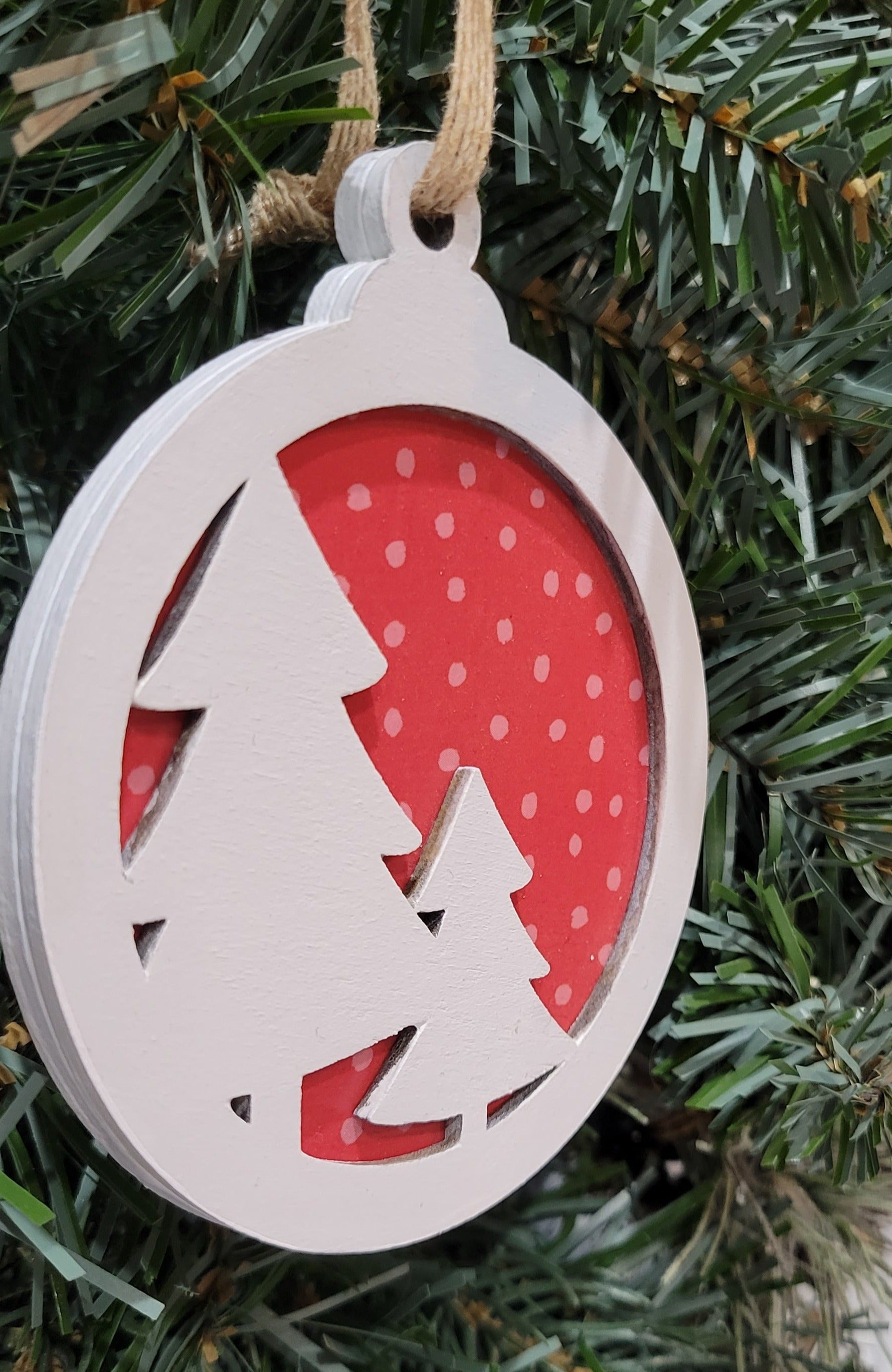 double layer wooden christmas tree with red polka dot background