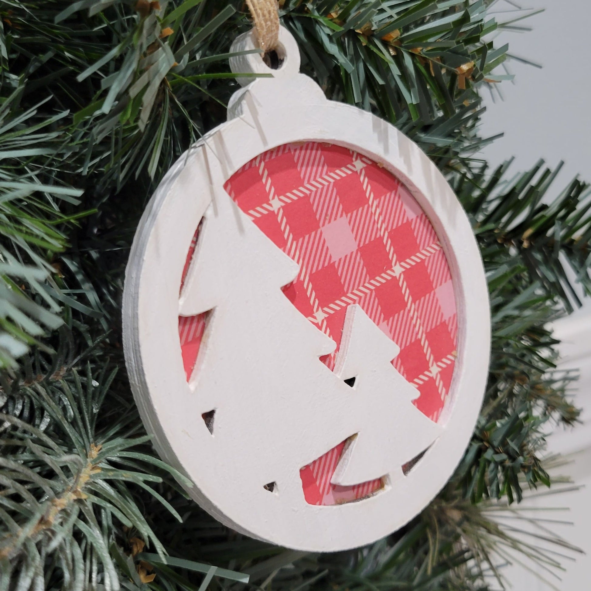 double layer wooden christmas tree with red plaid background