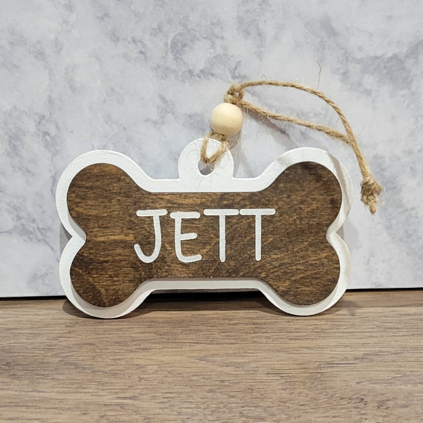 bone shaped ornament with your pets name on it