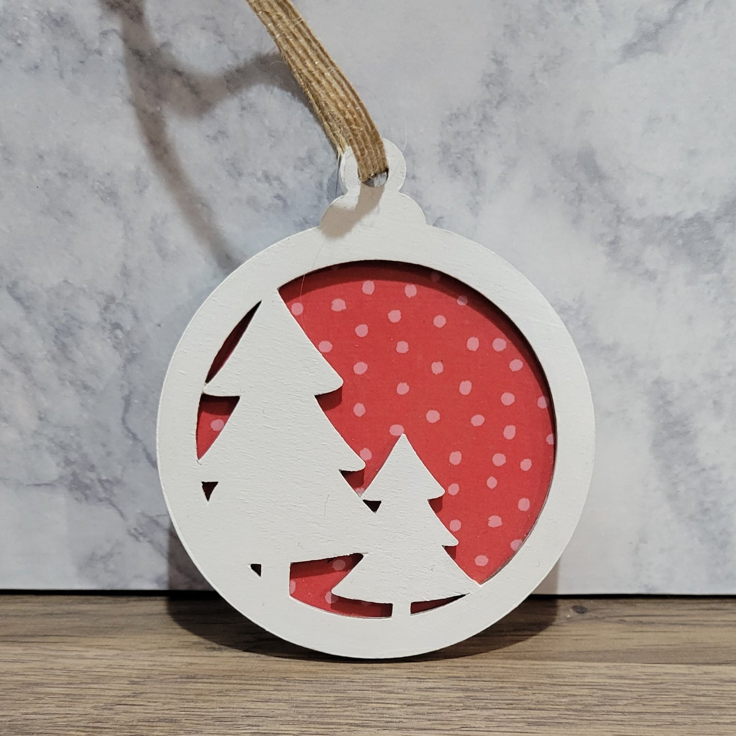 double layer wooden christmas tree with red polka dot background