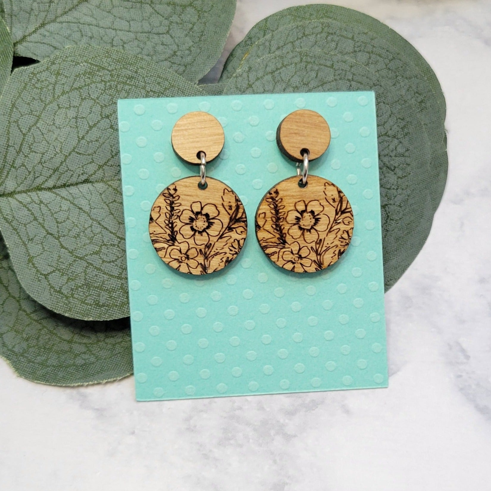 floral engraved wood earrings