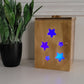 Golden Oak Stars Light Box with light on