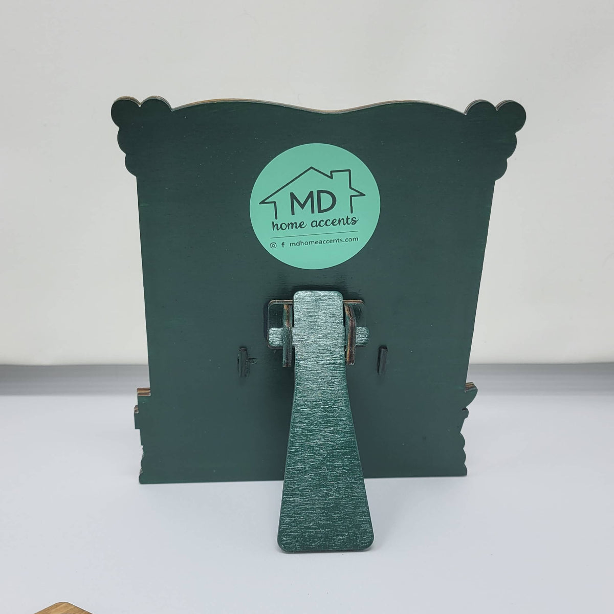 the back of the book sign showing the stand