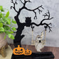 Ghost on a creepy Halloween tree swinging and drinking coffee
