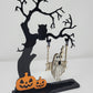 Ghost on a creepy Halloween tree swinging and drinking coffee 1