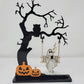 Ghost on a creepy Halloween tree swinging and drinking coffee front view white background