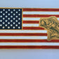 golden oak handmade carved flag with dark green fish sign