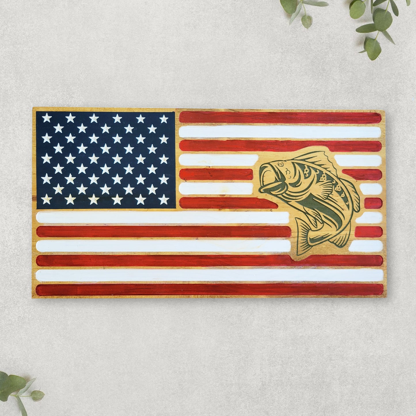 golden oak handmade carved flag with dark green fish sign