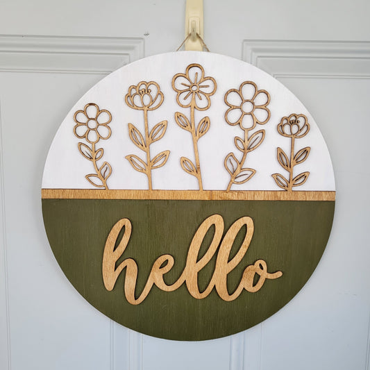 olive green, white and golden oak hello door hanger with cutout stemmed flowers hanging on door