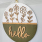 olive green, white and golden oak hello door hanger with cutout stemmed flowers hanging on door angled view