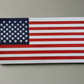 white wooden handmade carved flag sign