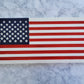 white wooden handmade carved flag sign