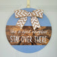 Like a Good Neighbor Stay Over There Door Hanger 15"