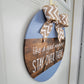 Like a Good Neighbor Stay Over There Door Hanger 15"